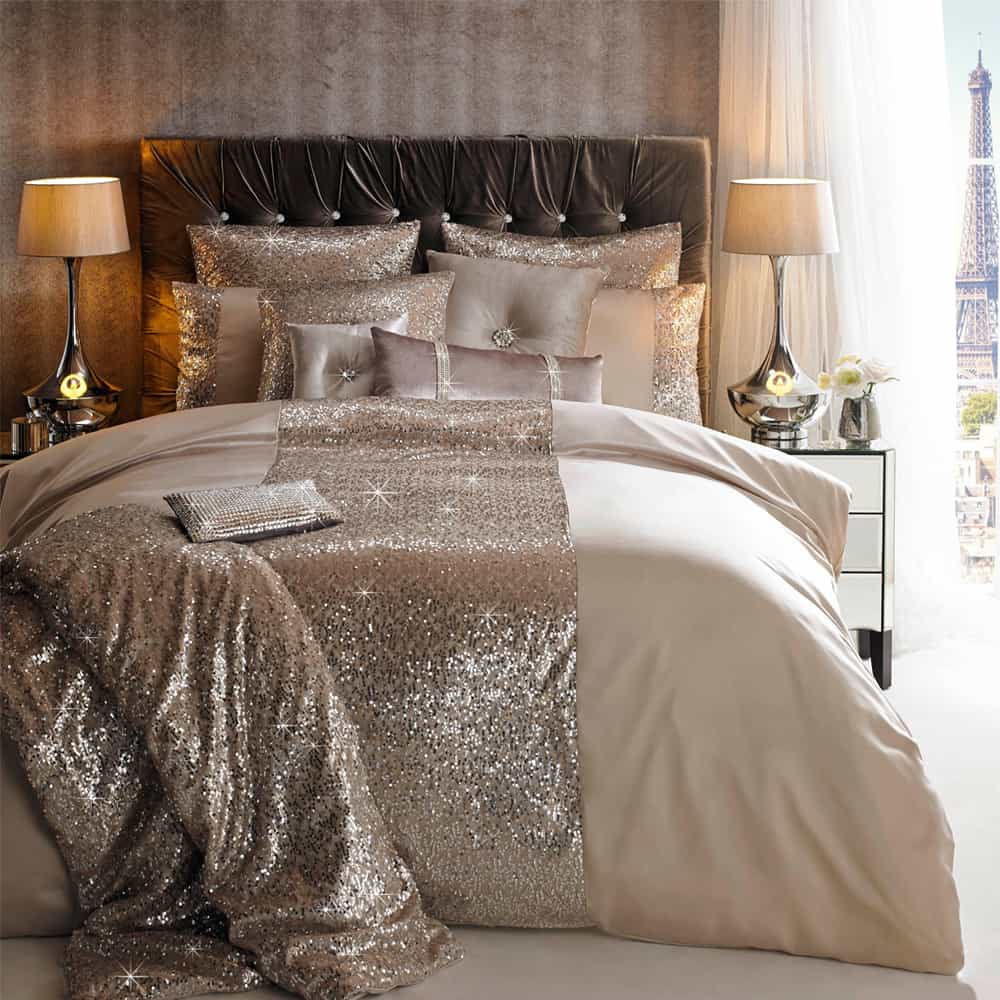 Luxury 12-piece cotton satin bedding set with sequin embroidery, including bedsheet, quilt, pillow covers, and decorative cushions in elegant colors for a royal bedroom look.